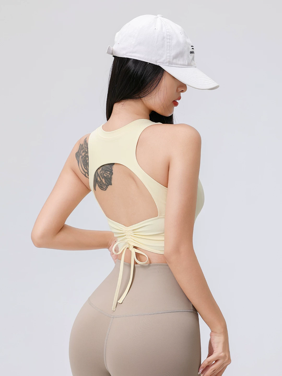 Áo tập yoga dành cho nữ có đệm ngực, thiết kế dây rút rỗng, áo thể thao tôn dáng lưng đẹp dành cho Pilates, chạy bộ, tập luyện và thể hình.