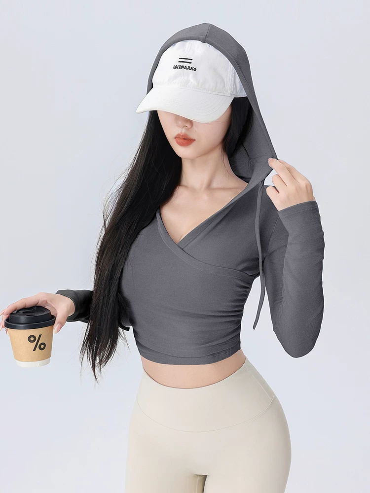 Quần áo tập yoga cho nữ 2026 phong cách mới bó sát chạy bộ thể thao ngoài trời Pilates áo có mũ thể dục dài tay mùa thu