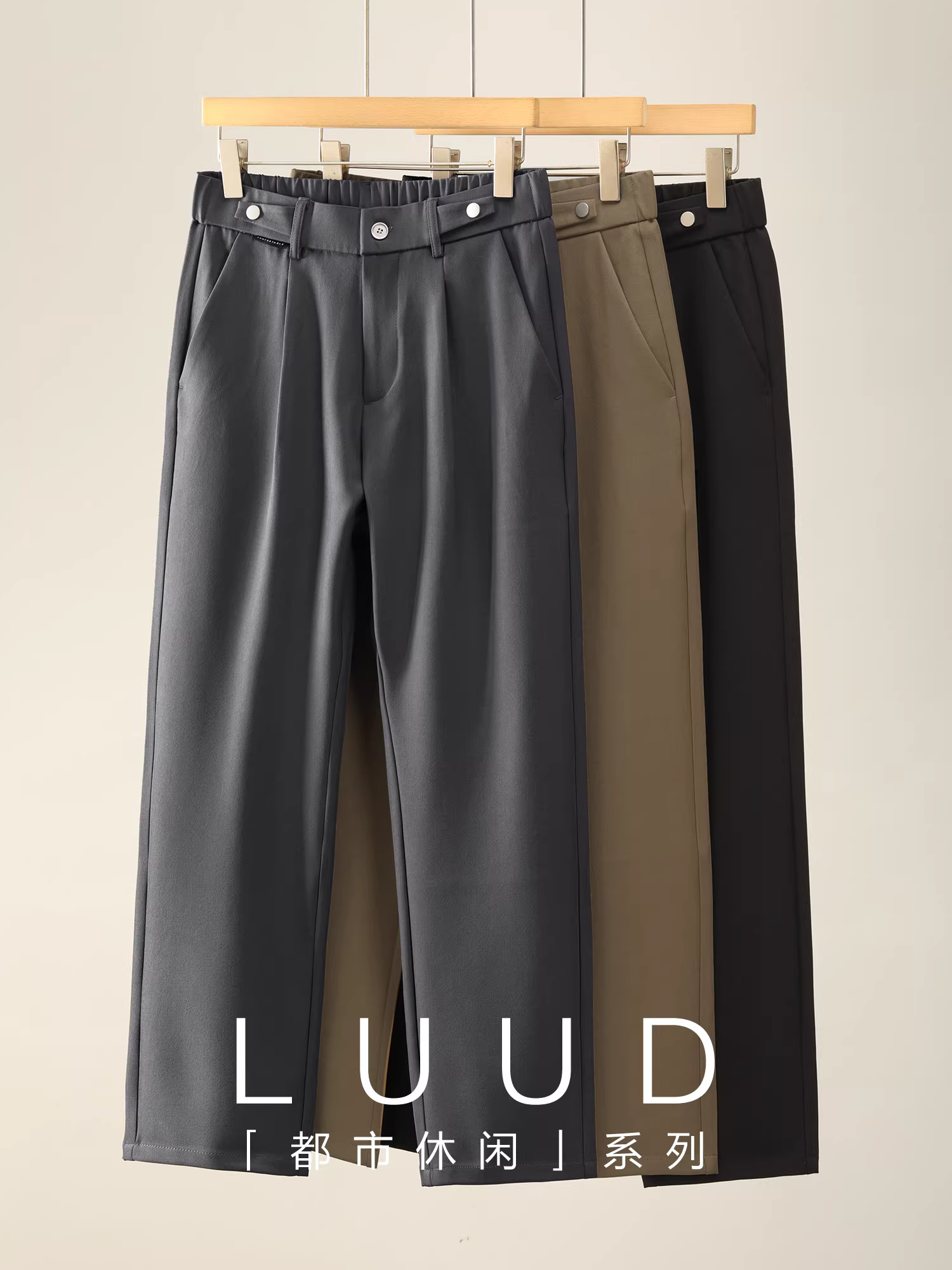 Quần tây nam LUUD Naples lưng thun bán co giãn, ống thẳng, dáng rộng, thiết kế đơn giản, cài khuy bấm, chất liệu mềm mại.