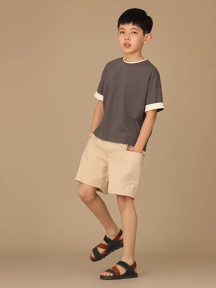 Quần áo trẻ em Hazi Mùa hè mới xuất hiện Quần short bảo hộ lao động bằng vải cotton nguyên chất thân thiện với da màu kaki Quần short kiểu dáng rộng rãi cho cha mẹ và con cái