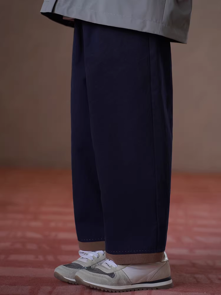 Quần áo trẻ em mùa xuân thu quần dài màu xanh hải quân cotton thân thiện với da quần thẳng bé trai và bé gái quần rộng rãi phong cách giản dị