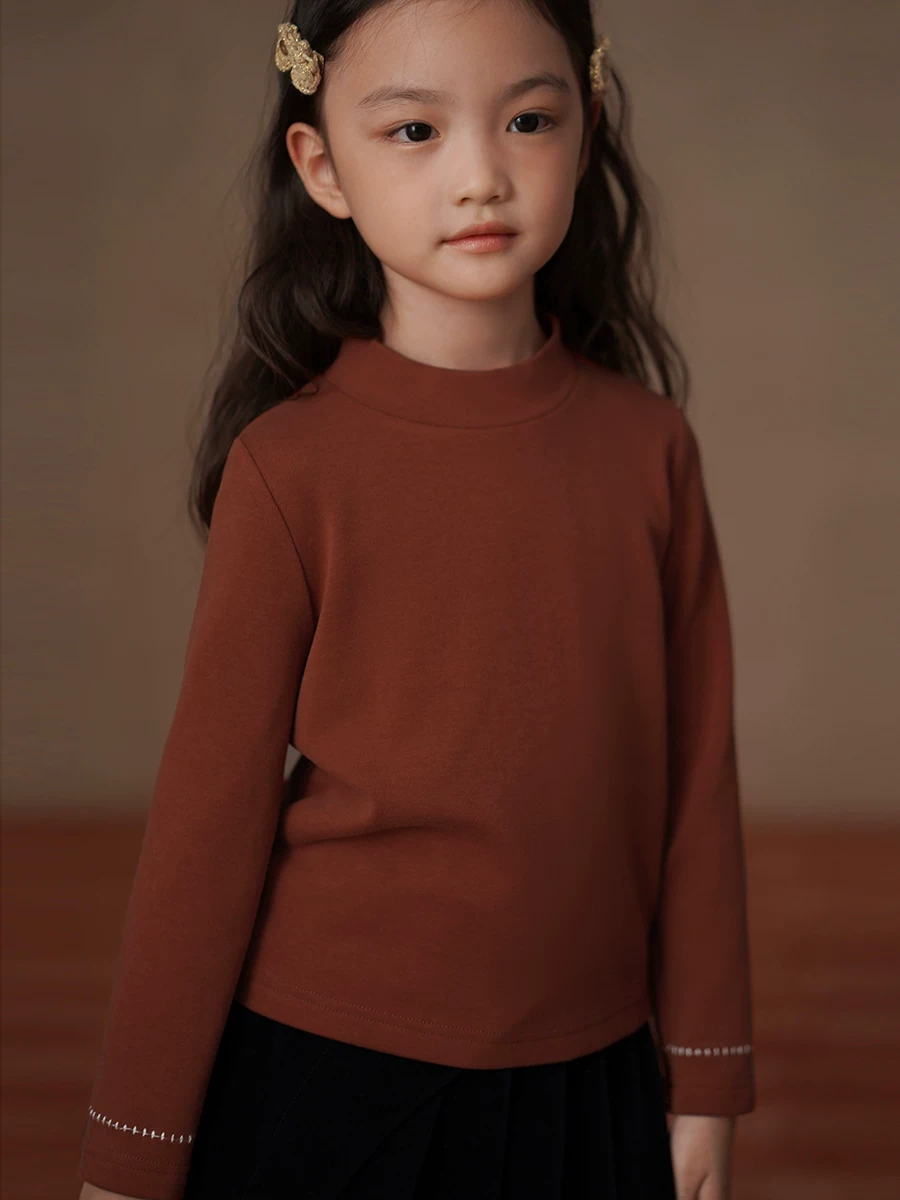 Quần áo trẻ em mùa thu đông Áo thun dài tay có lớp lót lông cừu, áo màu đỏ ấm áp cho bé gái, áo sơ mi cổ cao nửa cổ sành điệu.