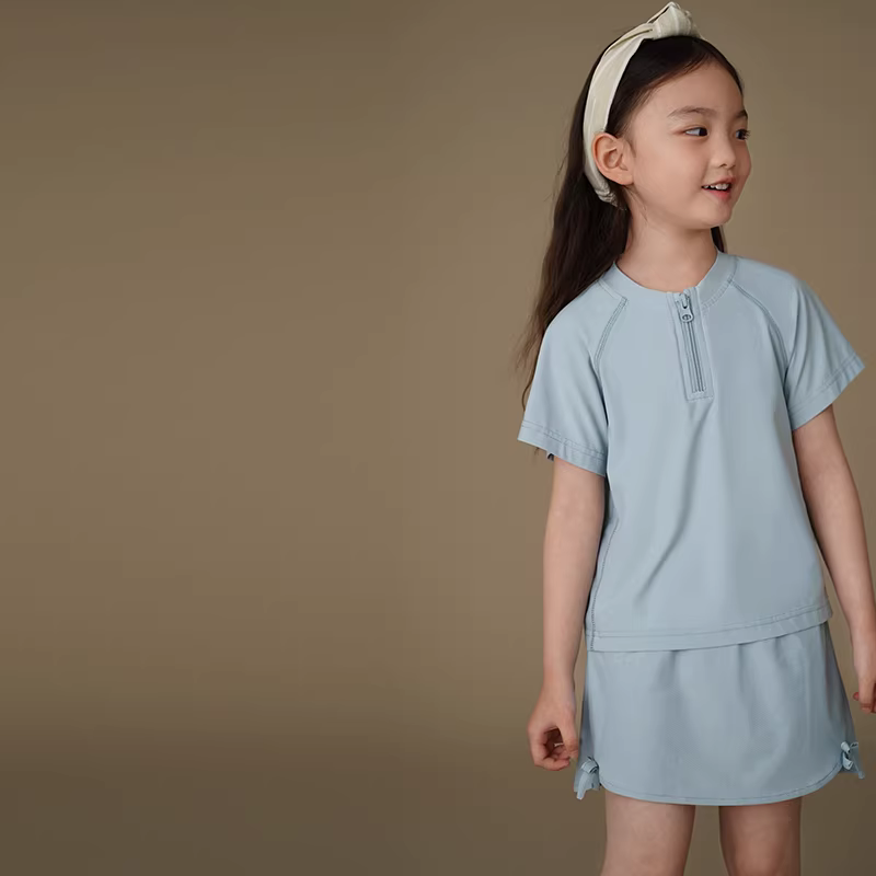 Quần áo trẻ em Hazi Mùa hè Phong cách mới Váy xanh trẻ em Váy ngắn đơn giản giản dị Váy ngắn thể thao khô nhanh cho bé gái