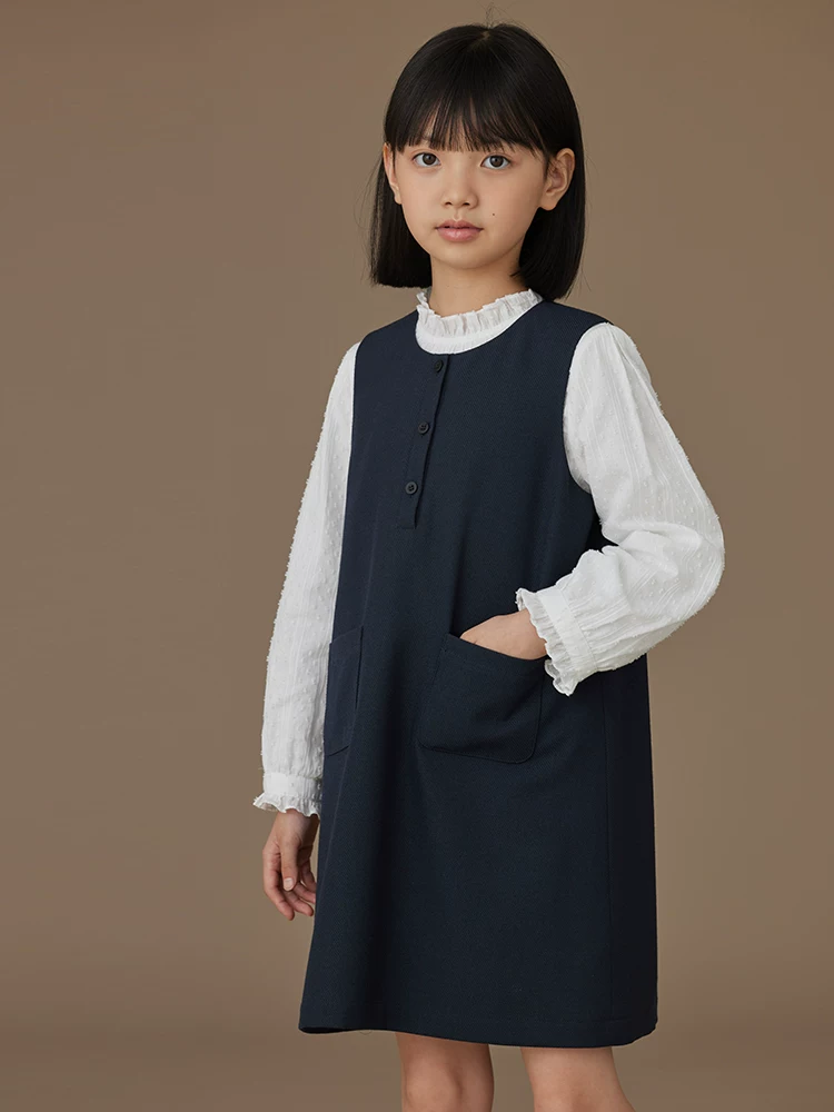 Quần áo trẻ em cho mùa xuân và mùa thu, váy liền thân kiểu học sinh màu xanh hải quân đơn giản và cao cấp dành cho trẻ lớn hơn.
