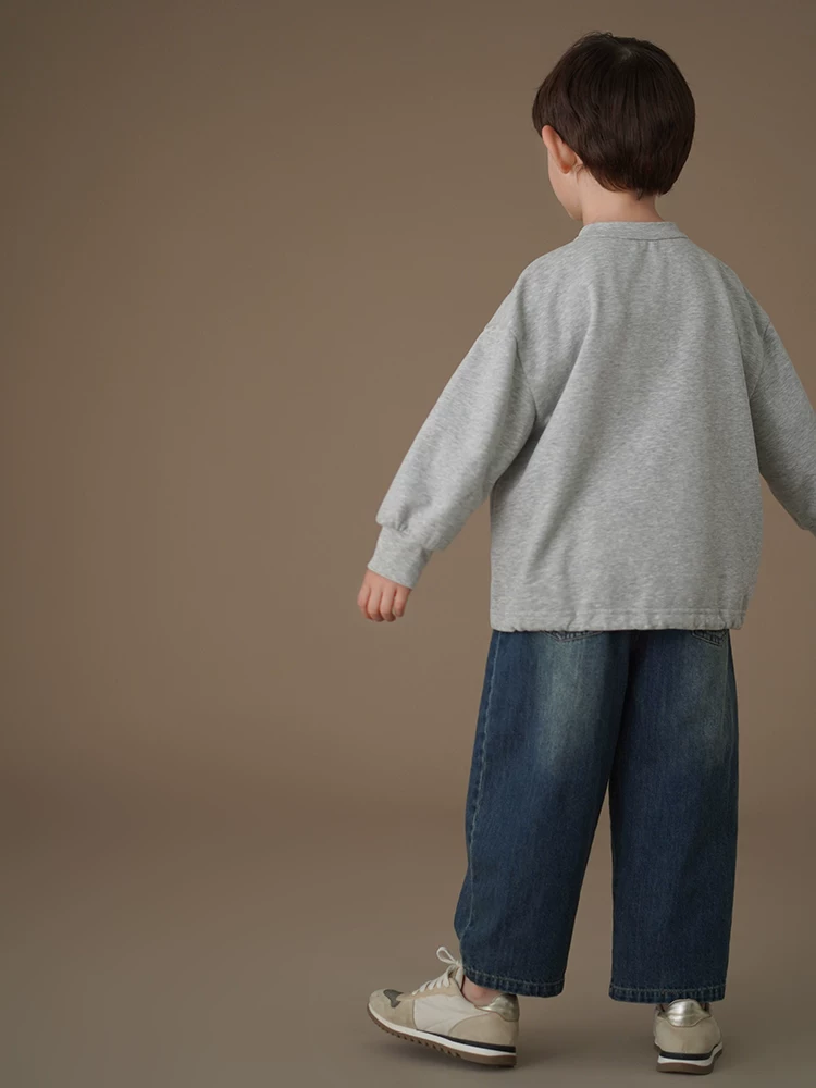 Quần áo trẻ em mùa xuân thu quần dài thường ngày đa năng quần denim rộng rãi đã qua xử lý giặt mềm mại dành cho bé trai và bé gái quần kiểu dáng thời trang cắt xéo