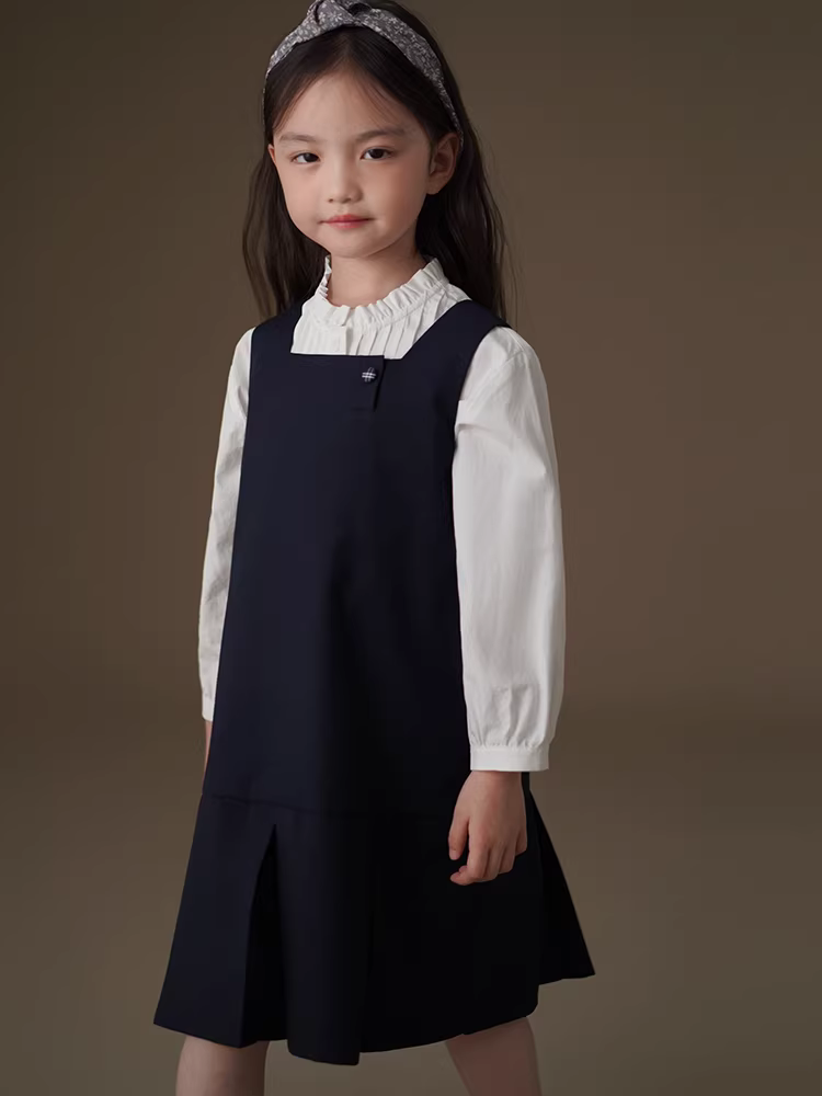 Quần áo trẻ em mùa xuân hè váy vest màu xanh hải quân đơn giản cao cấp phong cách học sinh váy mùa xuân mới cho bé gái