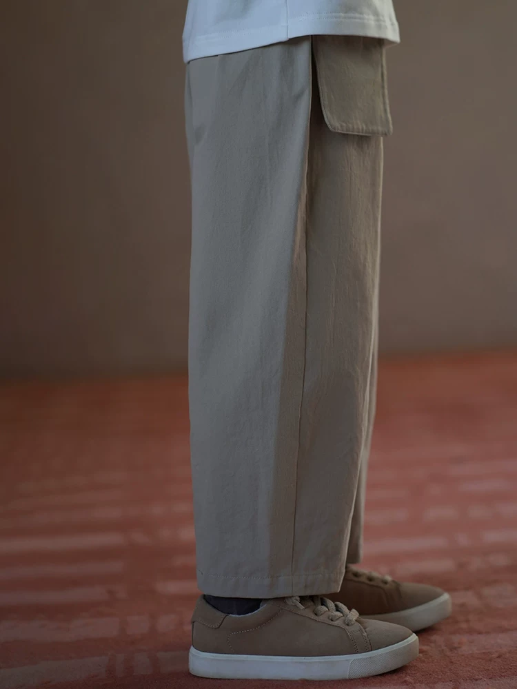 Quần dài trẻ em chất liệu cotton mềm mại, kiểu dáng thẳng, màu kaki, thích hợp cho bé trai và bé gái, phong cách thời trang, thích hợp cho mùa xuân và mùa thu.