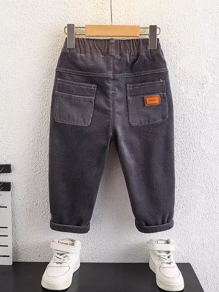 Quần mùa đông bé trai kiểu mới 2025, quần nỉ dày dặn, chất liệu vải dù, dáng rộng, thời trang cho bé trai