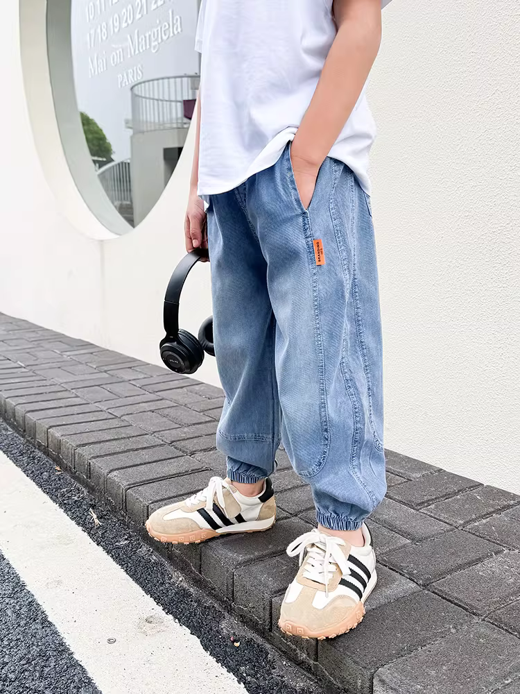 Quần bé trai mùa hè kiểu dáng mỏng, quần jean Tencel trẻ em kiểu dáng hè, quần chống muỗi cho bé trai đẹp trai, mặc hè mẫu mới 2025