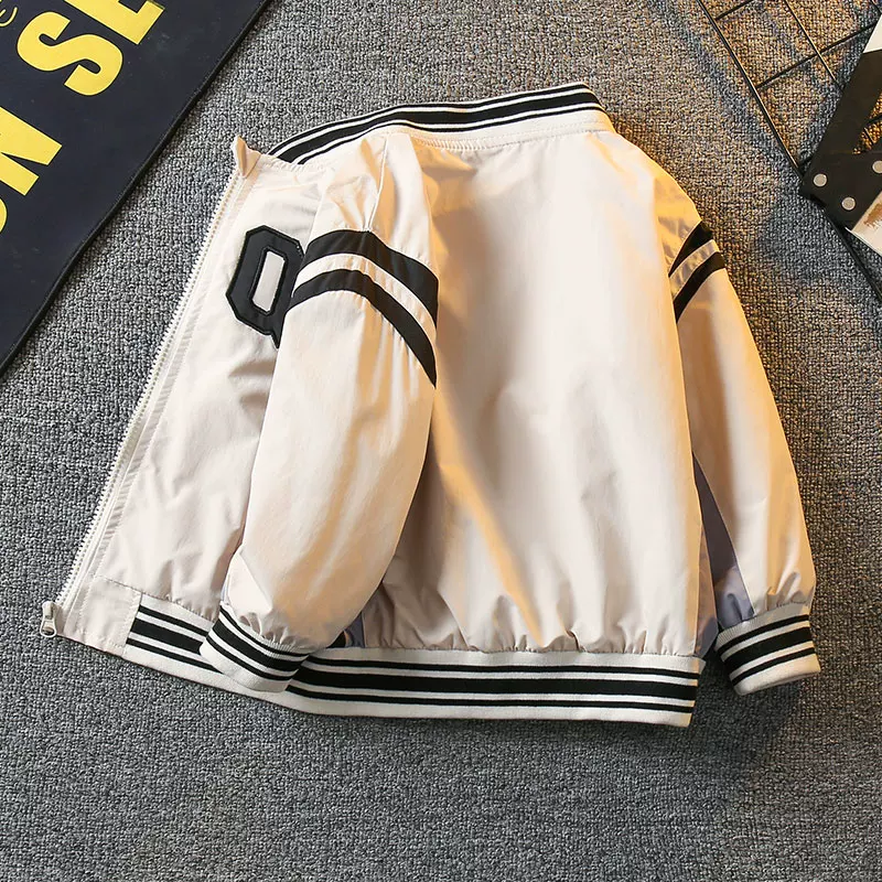 Áo khoác bóng chày bé trai kiểu mới 2025, quần áo xuân thu bé trai, thời trang phong cách Hàn Quốc, áo kiểu hot trên mạng