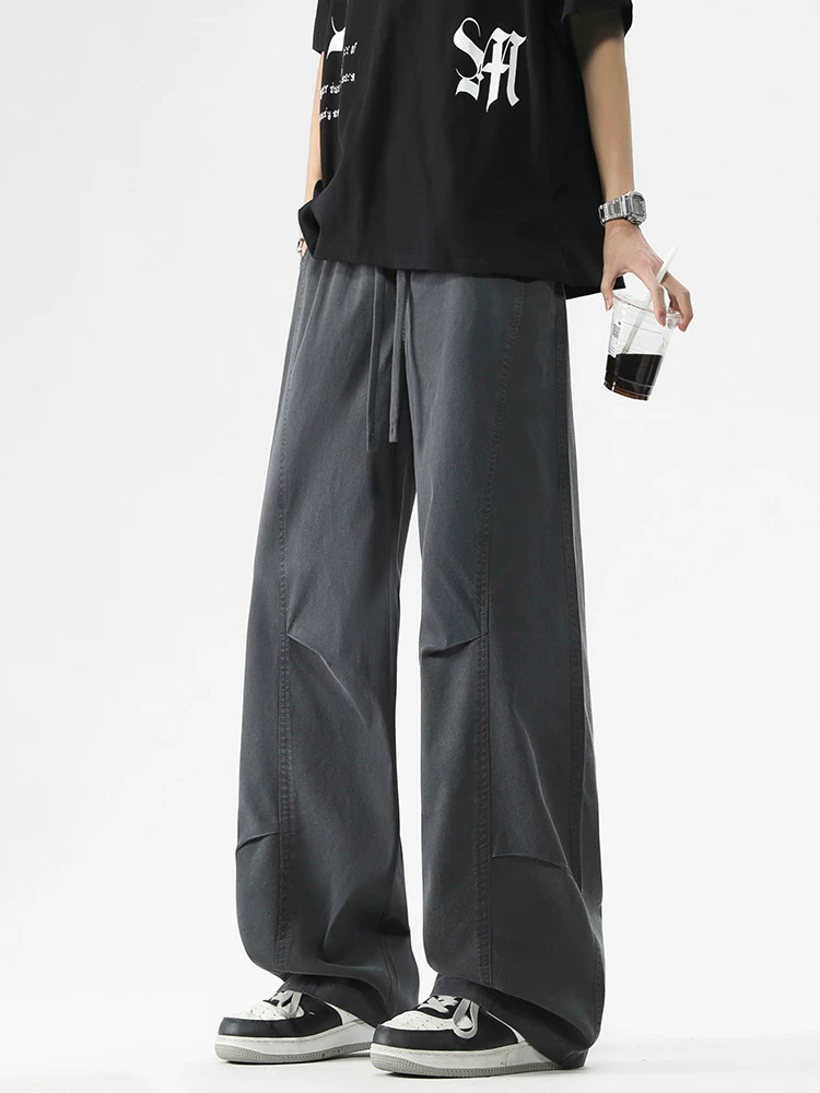 Quần dài nam phong cách Mỹ thời thượng, cá tính của Jeanswest, mẫu mới xuân thu 2026, quần công sở đa năng cao cấp.