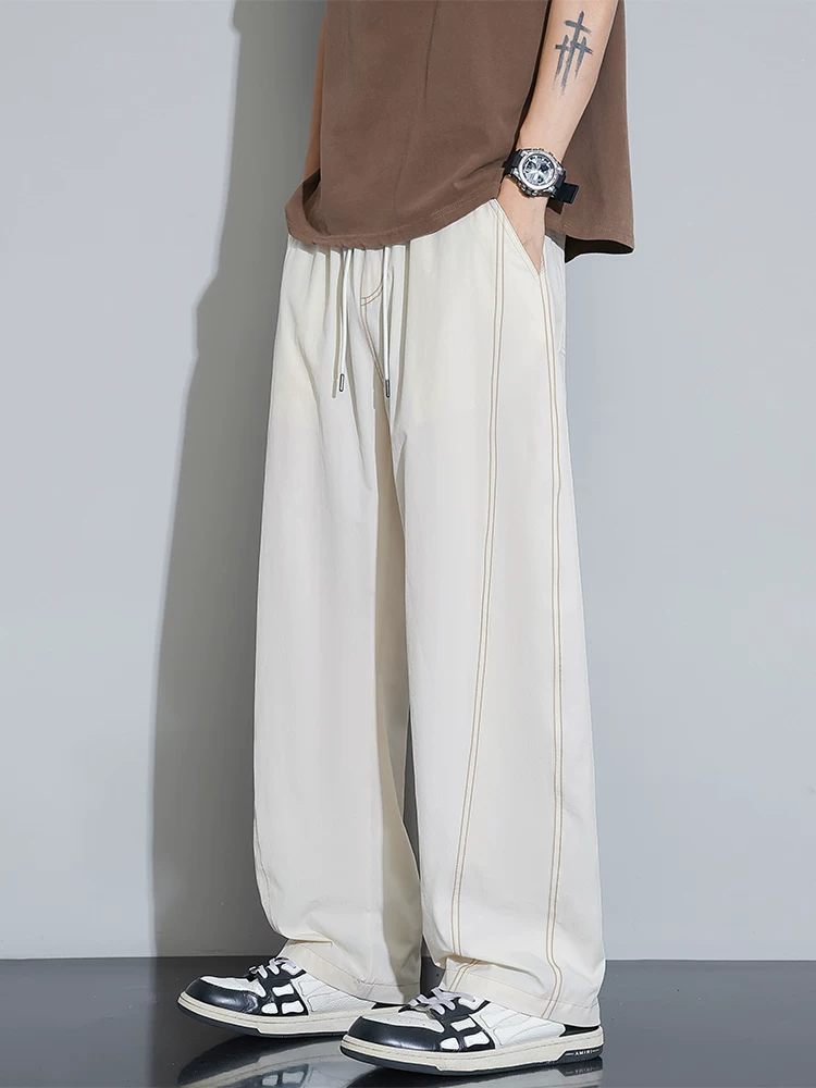 Quần dài nam chất liệu lụa băng kiểu Mỹ của Jeanswest, quần dài dáng rộng thời trang cao cấp mùa hè, có dây rút mỏng.