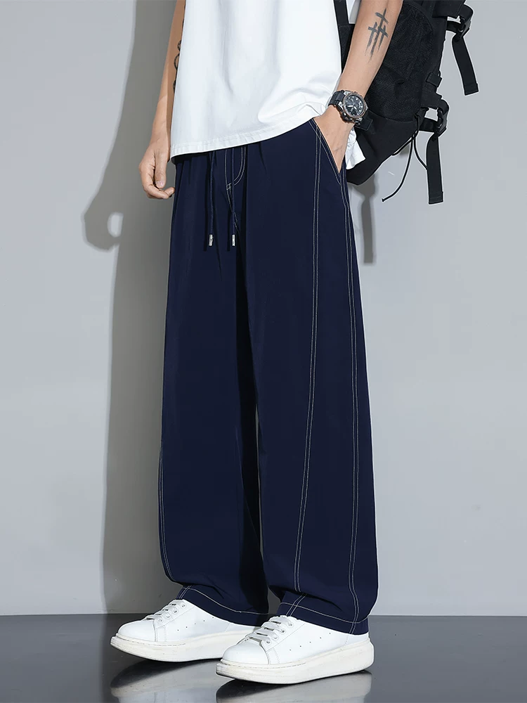 Quần âu nam Jeanswest phong cách Mỹ, mẫu mới hè 2026, dáng rộng, đa năng, quần thể thao ống đứng suông mềm mại.