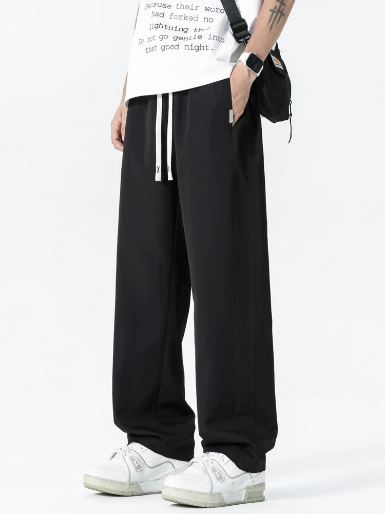 Quần dài nam Jeanswest chất liệu lưới mỏng, thoáng khí, nhanh khô, kiểu dáng thẳng, phong cách thường ngày, mẫu mới xuân/hè, thương hiệu thời trang, chất liệu lụa đá, dáng rộng.