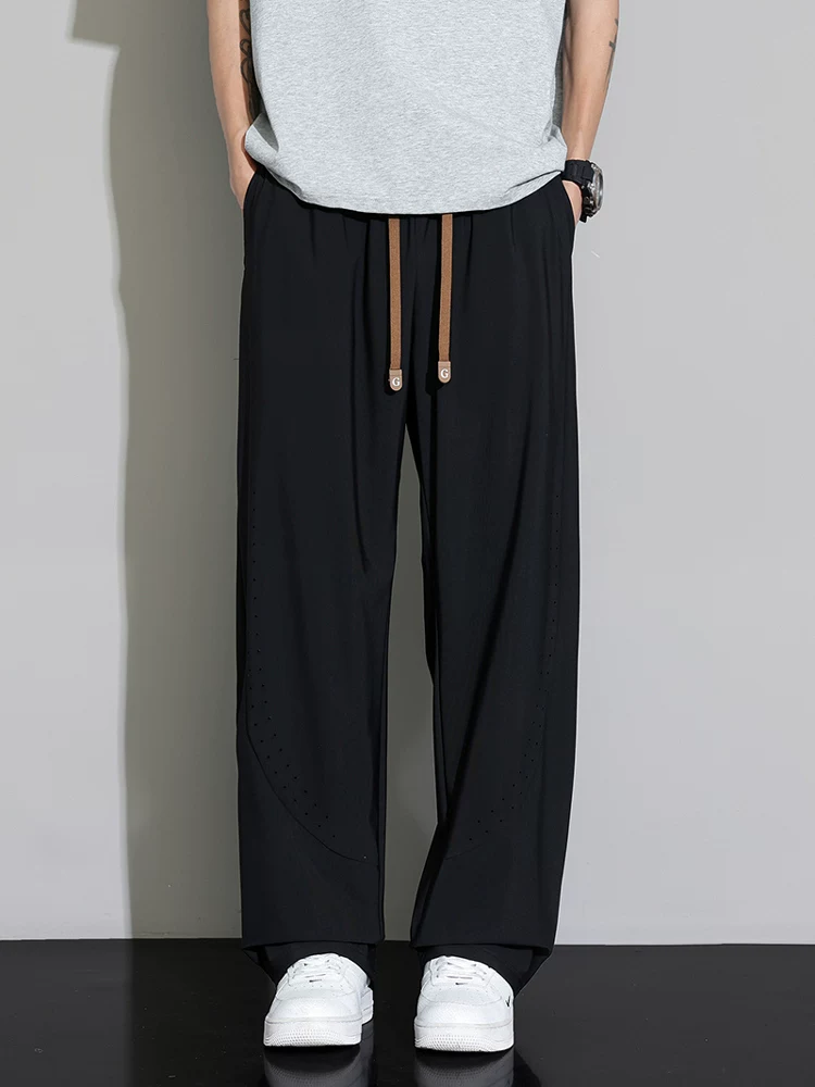 Quần Jeanswest Ice Silk Lưới mỏng thoáng khí, nhanh khô, ống thẳng dành cho nam, quần ống rộng dáng rộng đa năng mùa hè.