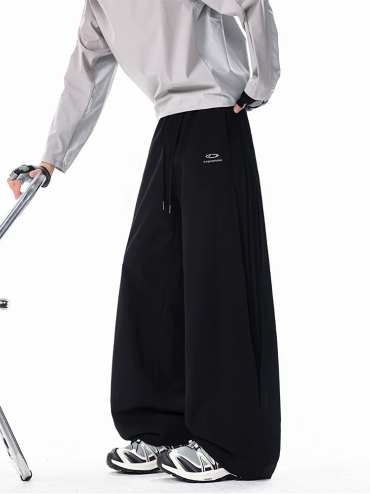 Quần ống rộng có dây rút cao cấp của Jeanswest dành cho nam, quần dài dáng rộng thể thao thường ngày mùa xuân thu.