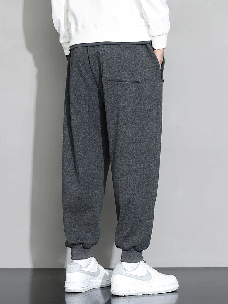 Quần cotton nguyên chất Jeanswest dành cho nam, quần thể thao dáng rộng, quần jogger nam xuân thu, quần dài đa năng cao cấp.