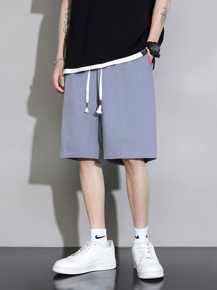 Quần short cotton nguyên chất Jeanswest dành cho nam, quần short thể thao mỏng thoáng khí mùa hè, dáng rộng, quần dài vừa phải, đa năng, phong cách thường ngày.