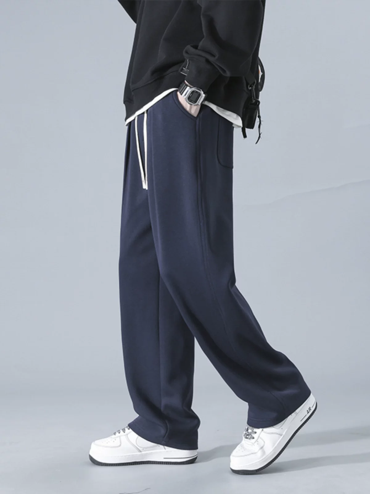 Quần jeanswest đơn sắc đơn giản dành cho nam, phong cách mới mùa xuân thu, quần thể thao ống rộng dáng suông đa năng.