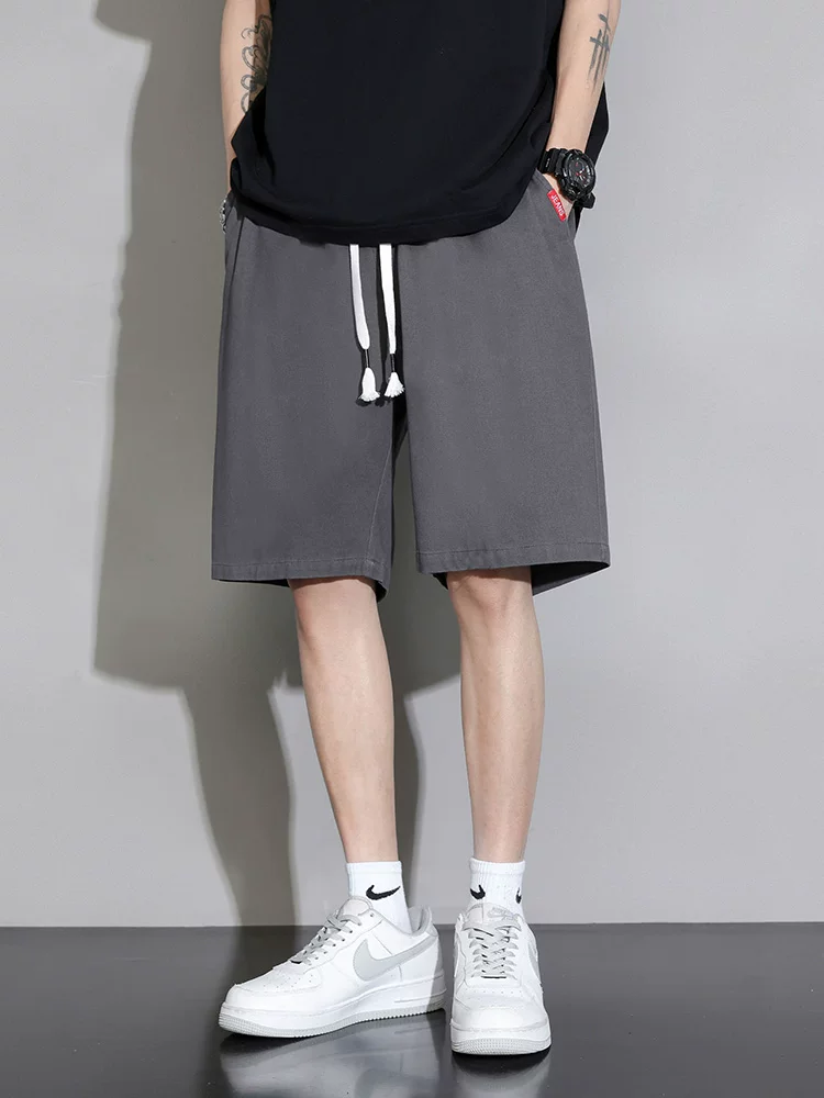 Quần short cotton nguyên chất Jeanswest dành cho nam, quần short thể thao mỏng thoáng khí mùa hè, dáng rộng, quần dài vừa phải, đa năng, phong cách thường ngày.