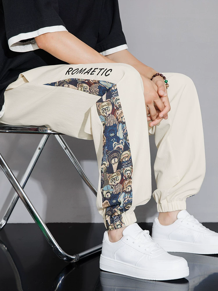 Quần jogger nam Jeanswest kiểu Mỹ thời trang, chất liệu lụa đá mỏng, mùa hè 2025, mới, thoáng khí, đa năng, dáng rộng, quần thể thao.