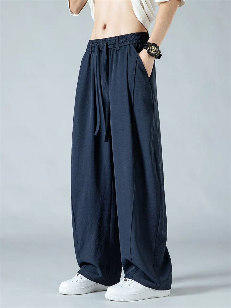 Quần âu nam Jeanswest 2025 chất liệu lụa đá mỏng, nhanh khô, dáng thẳng, mùa hè, đơn giản, rộng rãi, đa năng, phong cách thường ngày.