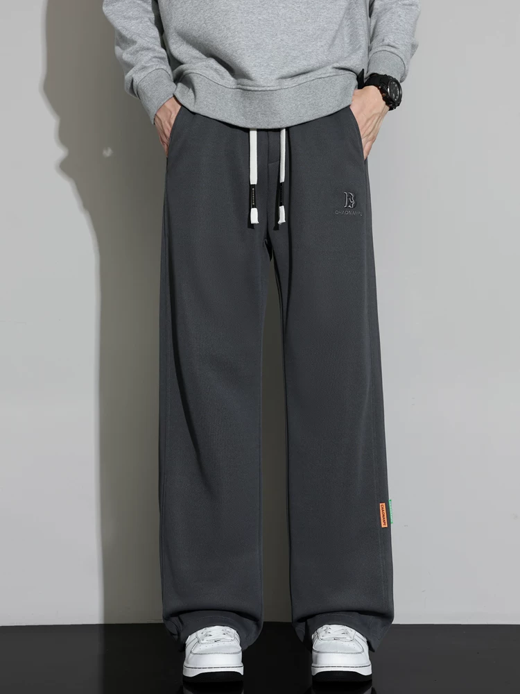 Quần dài ống suông kiểu Mỹ của Jeanswest dành cho nam, mùa xuân thu, cảm giác cao cấp, dáng rộng, có dây rút, quần dài đa năng.