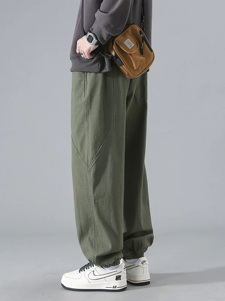 Quần jogger nam Jeanswest kiểu Mỹ, dáng rộng, màu trơn, in chữ, chất liệu dày dặn, đa năng, thích hợp cho mùa thu đông.