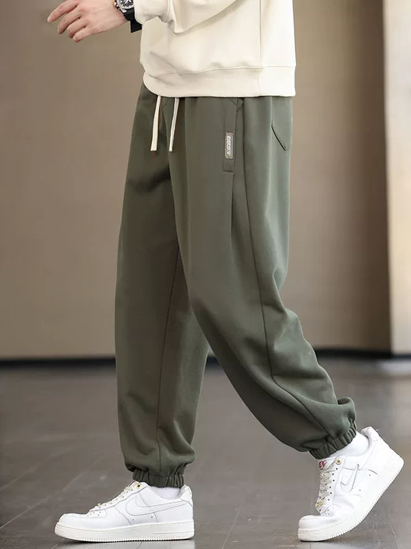 Quần jogger thể thao đa năng thiết kế nhãn màu trơn của Jeanswest, quần thể thao nam mới mùa xuân thu, quần thể thao thông thường