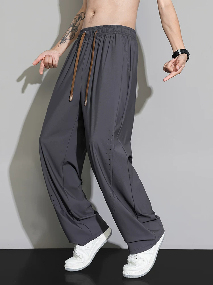 Quần Jeanswest Ice Silk Lưới mỏng thoáng khí, nhanh khô, ống thẳng dành cho nam, quần ống rộng dáng rộng đa năng mùa hè.
