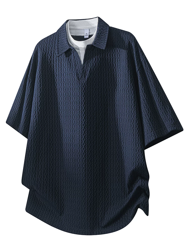 Áo thun ngắn tay cổ bẻ giả hai mảnh phong cách Mỹ của Jeanswest dành cho nam, áo thun màu đen dáng rộng thường ngày mùa xuân hè.