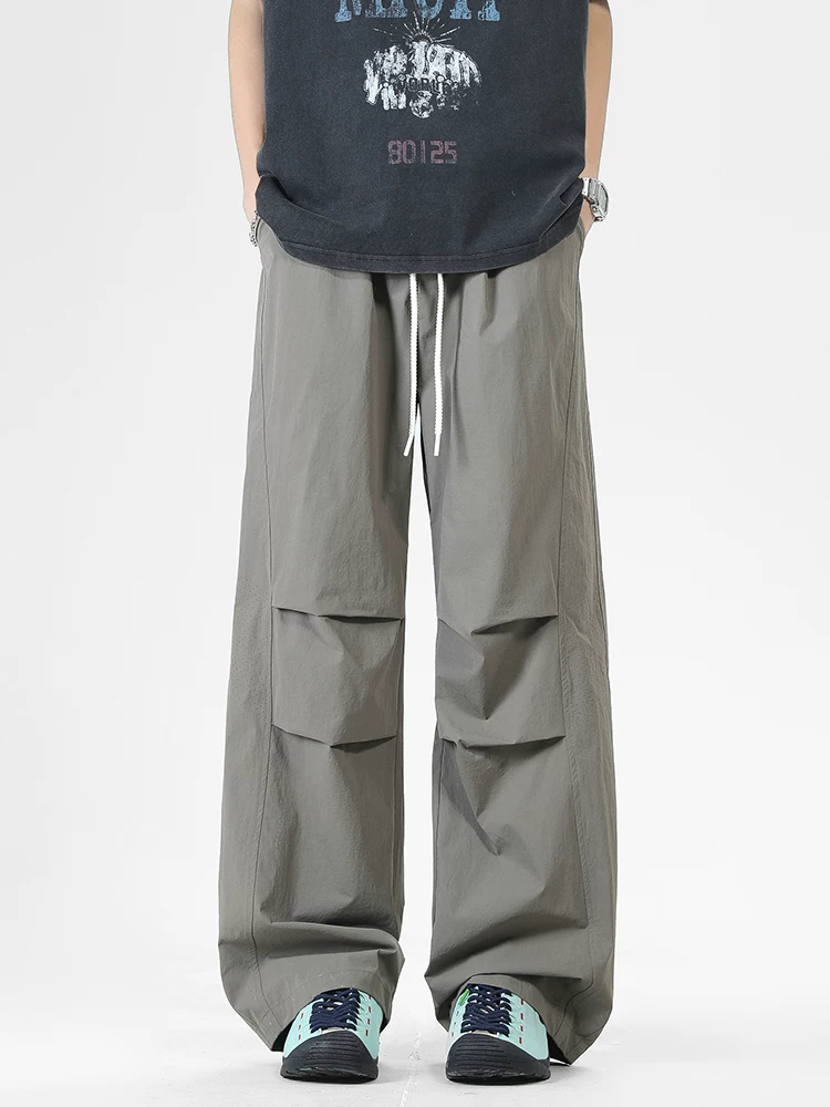 Quần dài ống rộng có dây rút kiểu Mỹ của Jeanswest dành cho nam, mùa xuân thu, thương hiệu thời thượng cao cấp, quần dài cá tính và sành điệu.
