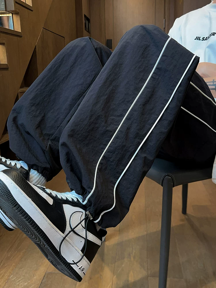 Quần jeanswest nam mùa hè vải lụa mỏng mới kiểu dáng thẳng rộng phong cách Mỹ quần thường ngày