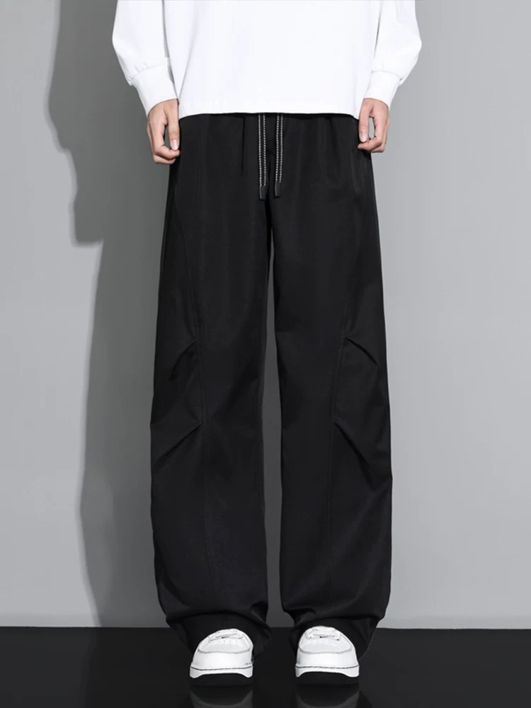 Quần dài ống đứng thời trang phong cách Mỹ của Jeanswest dành cho nam, mùa xuân thu, cảm giác cao cấp, dáng rộng, đa năng, quần dài có độ rủ.
