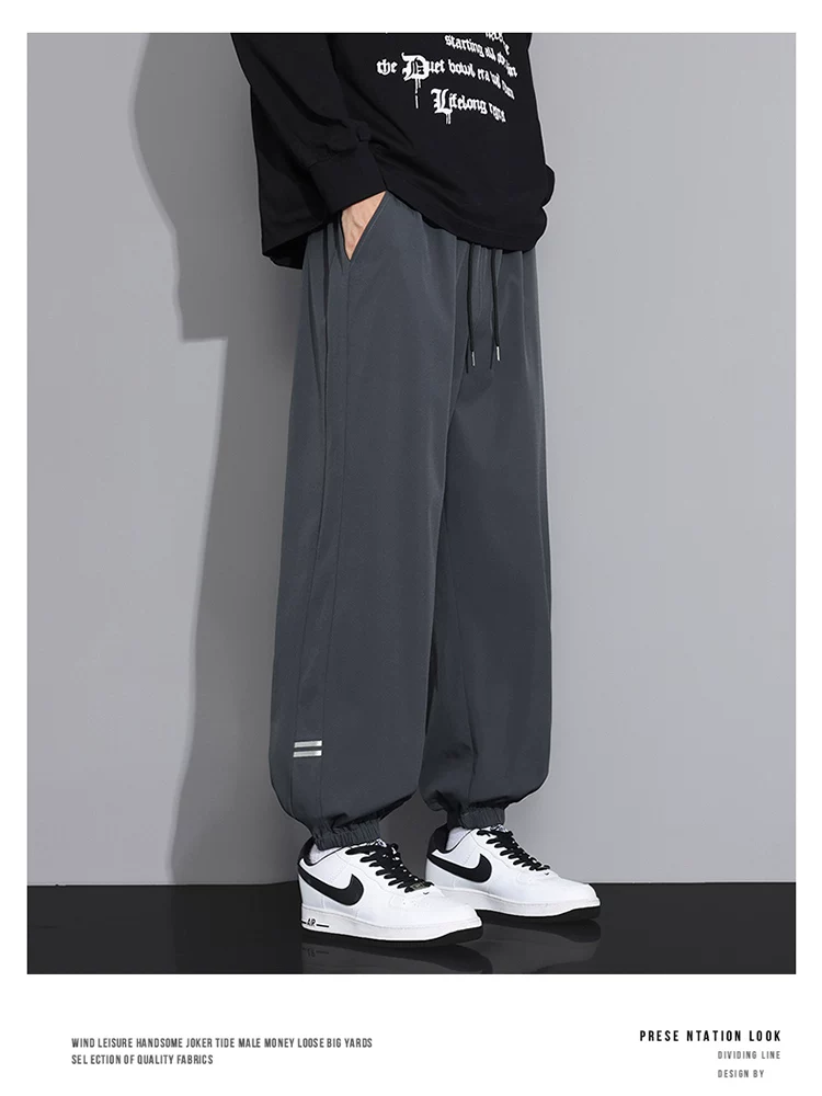 Quần jogger thể thao kẻ sọc có dây rút của Jeanswest dành cho nam, mẫu mới xuân thu 2026, kiểu dáng Mỹ, ống thẳng, rộng rãi, thoải mái.