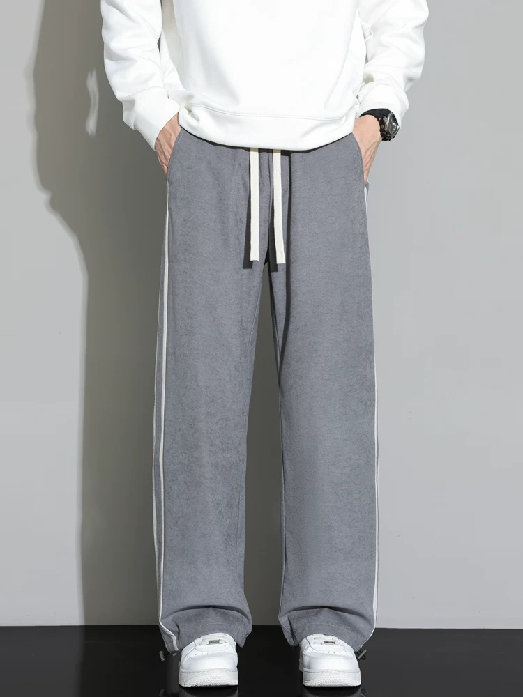 Quần jogger sọc thẳng kiểu Mỹ thời thượng của Jeanswest dành cho nam, mùa xuân thu, cảm giác cao cấp, dáng suông, rộng rãi, quần dài đa năng.