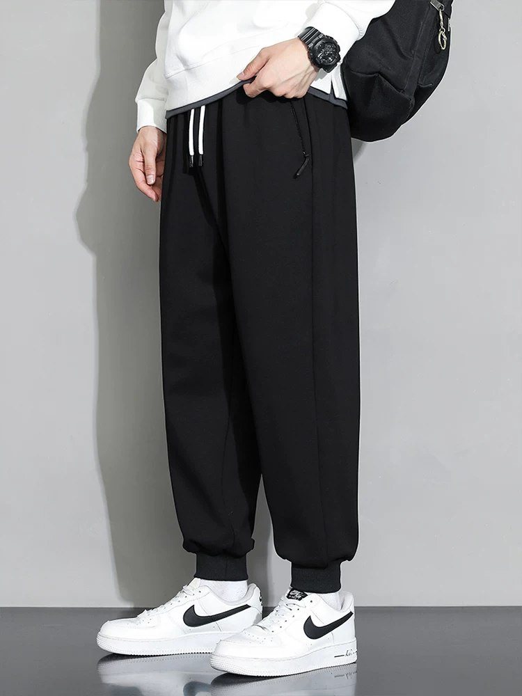 Quần cotton nguyên chất Jeanswest dành cho nam, quần thể thao dáng rộng, quần jogger nam xuân thu, quần dài đa năng cao cấp.