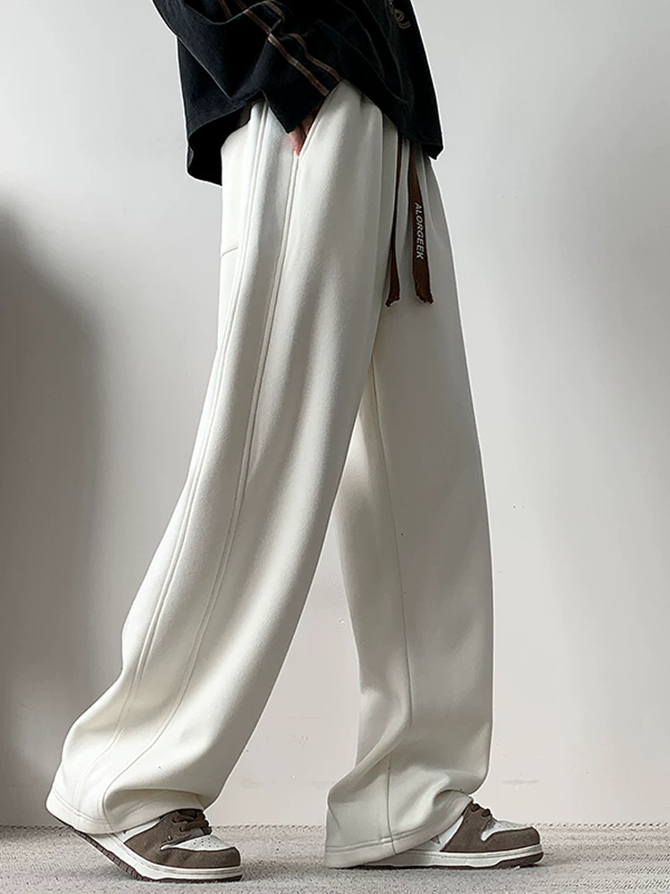 Quần thể thao ống rộng dáng thẳng hợp thời trang theo phong cách Mỹ của Jeanswest dành cho nam, mẫu mới mùa xuân thu với cảm giác cao cấp và hiệu ứng rủ mềm mại, quần thể thao thường ngày.