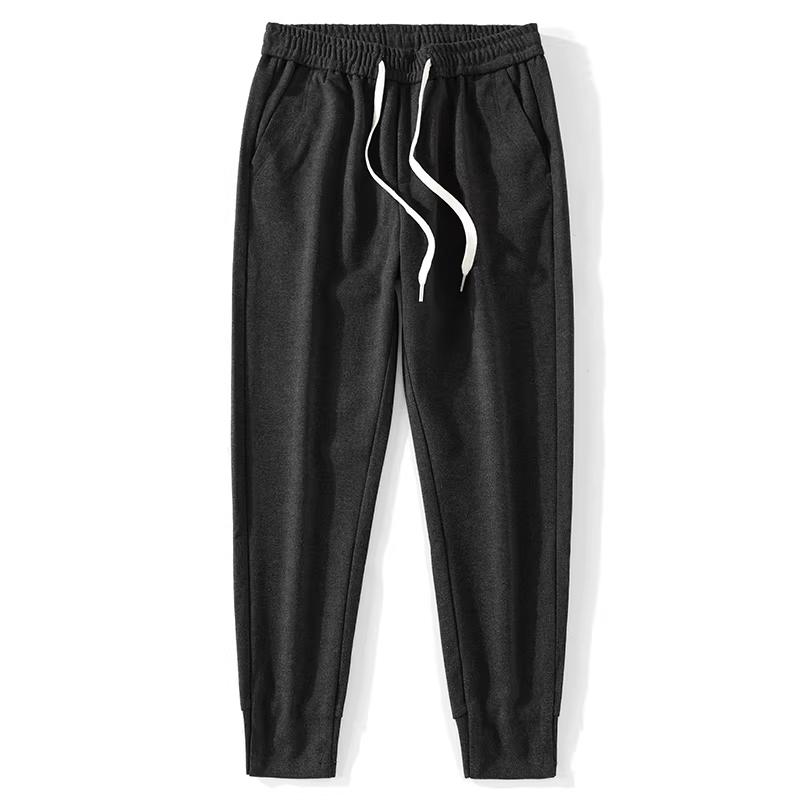 Quần thể thao nam chất liệu len ấm áp, kiểu dáng ôm sát thể thao, có dây thun và dây rút ở eo.