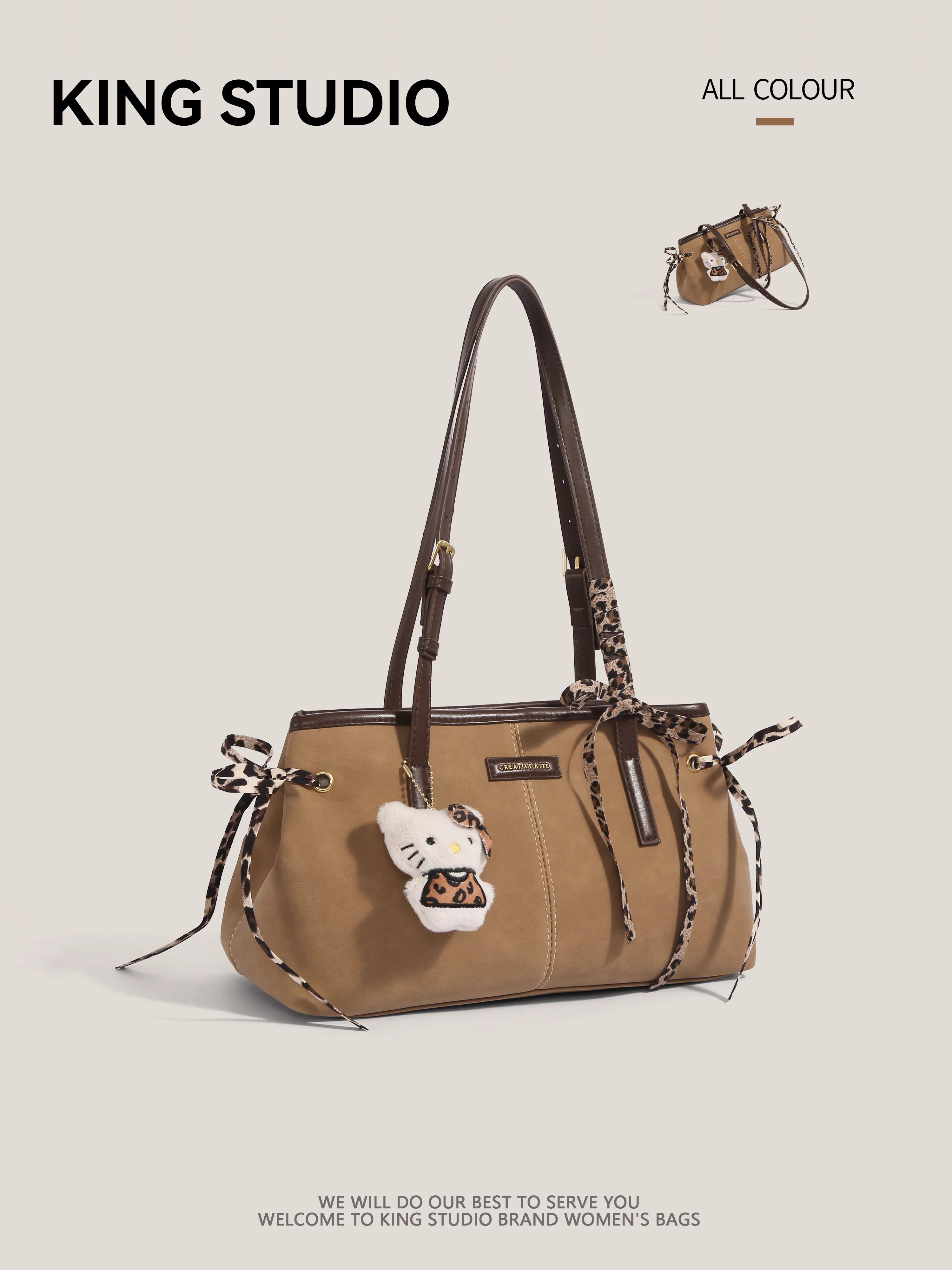 Túi tote cỡ lớn nơ bướm dành cho nữ, mẫu mới 2025, túi xách cao cấp đi làm, phong cách phóng khoáng, đeo vai/nách