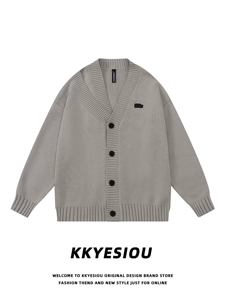 Áo khoác cardigan dệt kim cổ chữ V không đều kiểu dáng cổ điển Mỹ, phong cách unisex, màu xám, kiểu dáng học sinh.