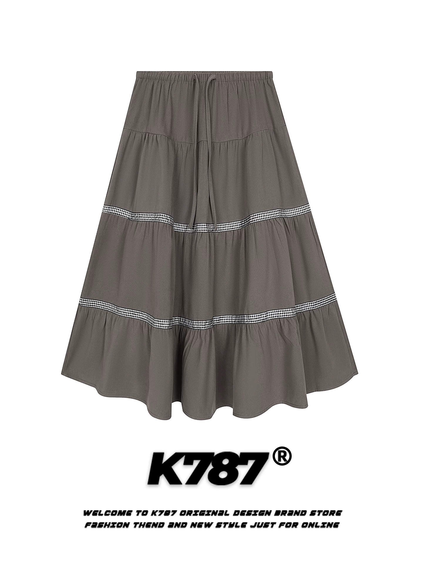 Váy xếp ly kiểu Mỹ đơn giản, chất liệu vải dù kẻ caro, phối nhiều mảnh, cạp cao, dáng rộng, tôn dáng, phong cách dễ thương, kiểu dáng bánh bèo, dáng chữ A.