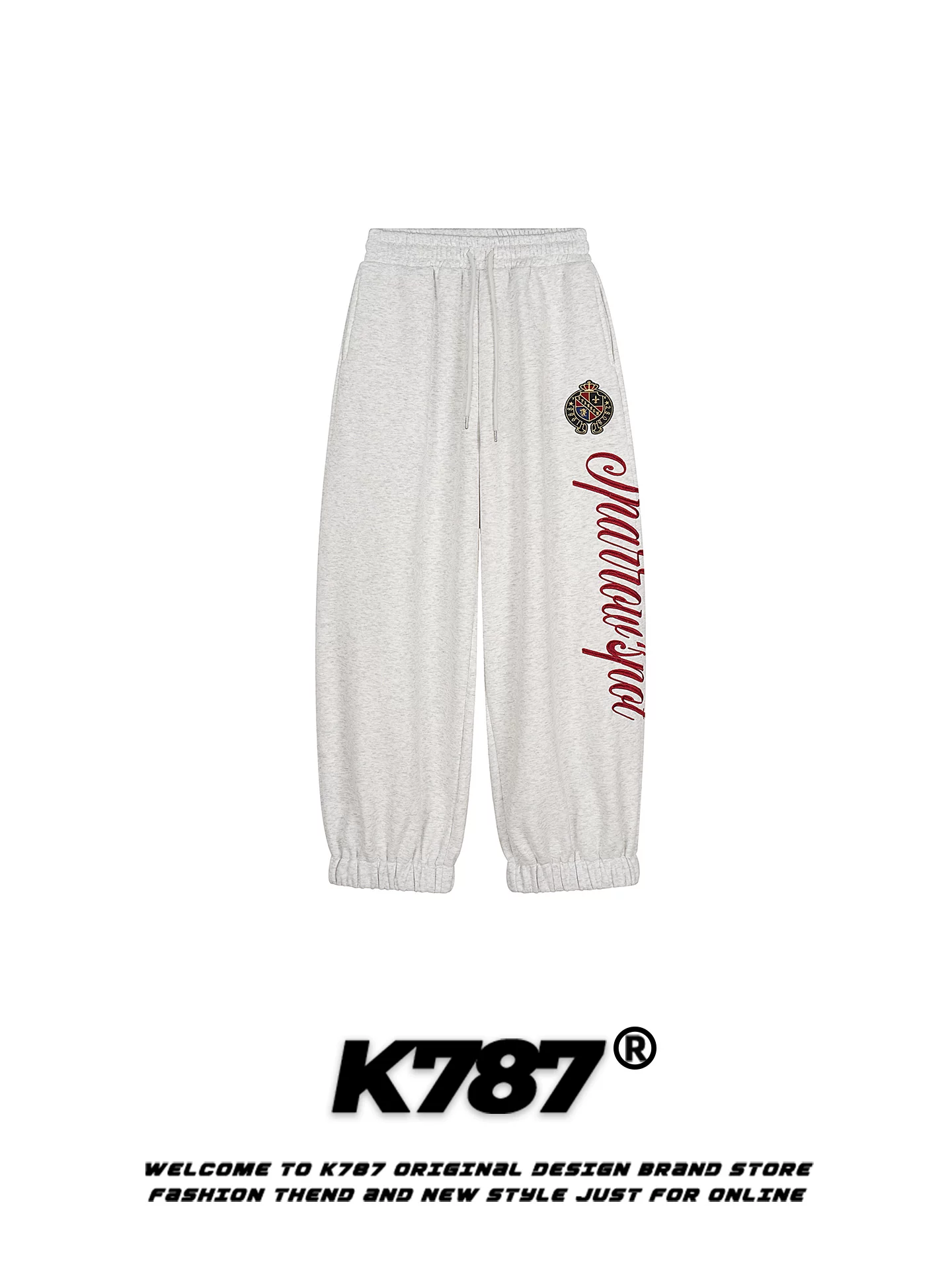 Quần jogger thể thao rộng ống, kiểu dáng unisex, chất liệu thun kiểu Mỹ K787, có thêu chữ bên hông.
