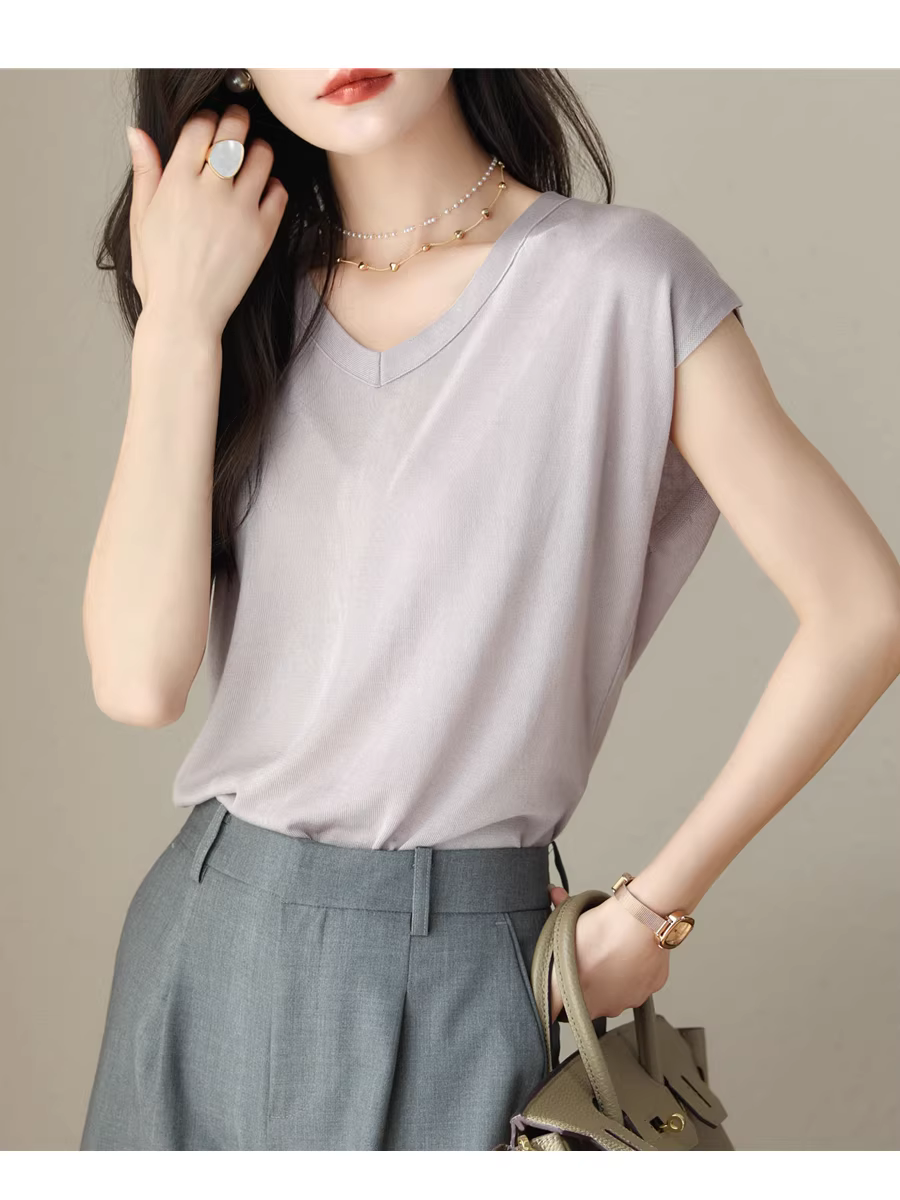 Áo thun nữ cao cấp chất liệu Tencel mát mẻ, dáng ôm, cổ chữ V, không tay, kiểu dáng ngắn, mới cho mùa hè.