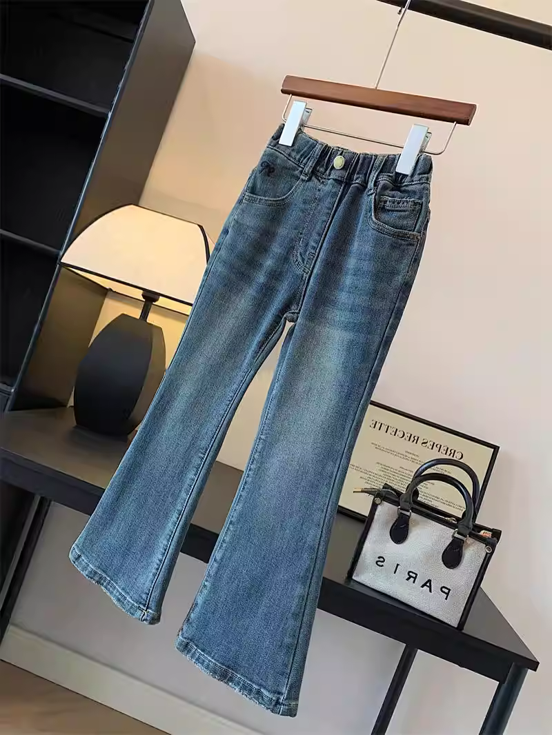 Quần nhung liền thân dáng ôm đa năng cho bé gái, quần denim cạp cao giặt mềm mùa thu đông 2025 mới