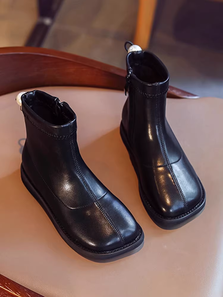 Giày bốt Martin dành cho nữ mùa xuân thu 2025 Giày bốt ngắn da thật mùa thu đông lót lông cừu Giày bốt trẻ em sành điệu mùa xuân thu Giày bốt đơn
