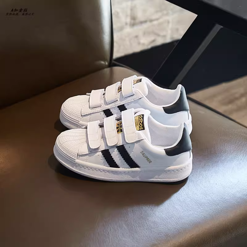 Giày trắng kiểu mới 2025 dành cho bé gái, giày thể thao thoáng khí mùa xuân thu, giày da thật thời trang mới cho bé trai