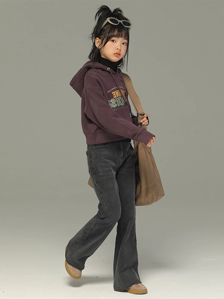 Quần jeans trẻ em xuân thu 2025 kiểu mới quần loe bé gái cho trẻ lớn quần thun co giãn thời trang thương hiệu quần dài đen phong cách thường ngày