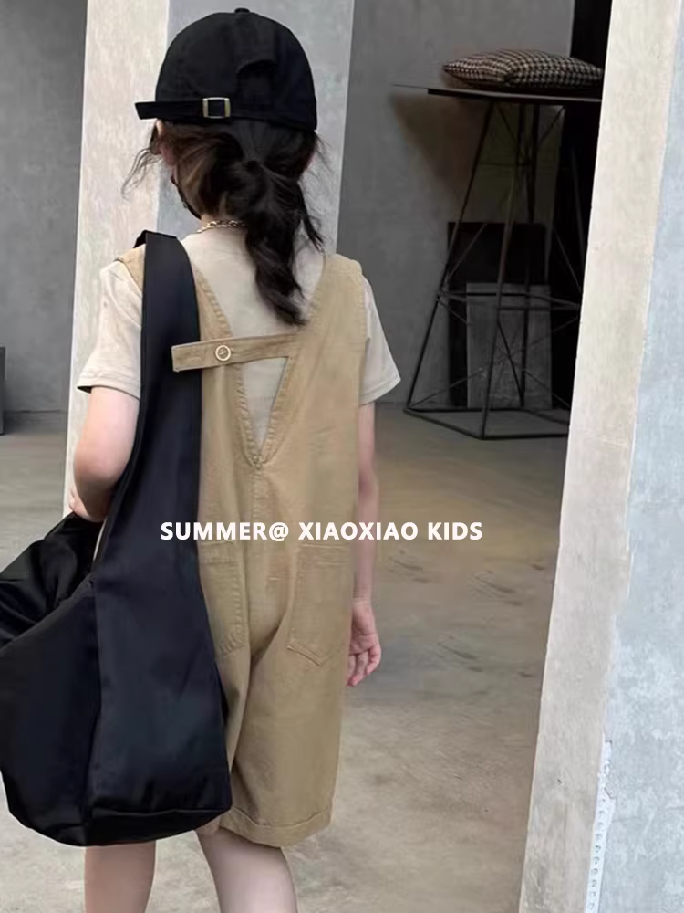 Quần đùi yếm bé gái hè 2025 kiểu mới quần kiểu Hàn Quốc thời trang năng động quần cargo trẻ em hè quần năm phần