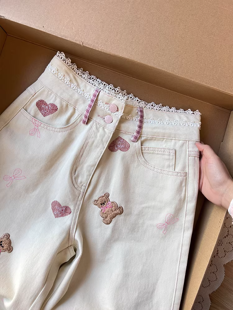 Quần jean phối ren cho bé gái, kiểu thu đông 2025 mới, quần ống đứng thêu thời thượng dành cho trẻ lớn, quần dài dáng nhỏ nhắn.